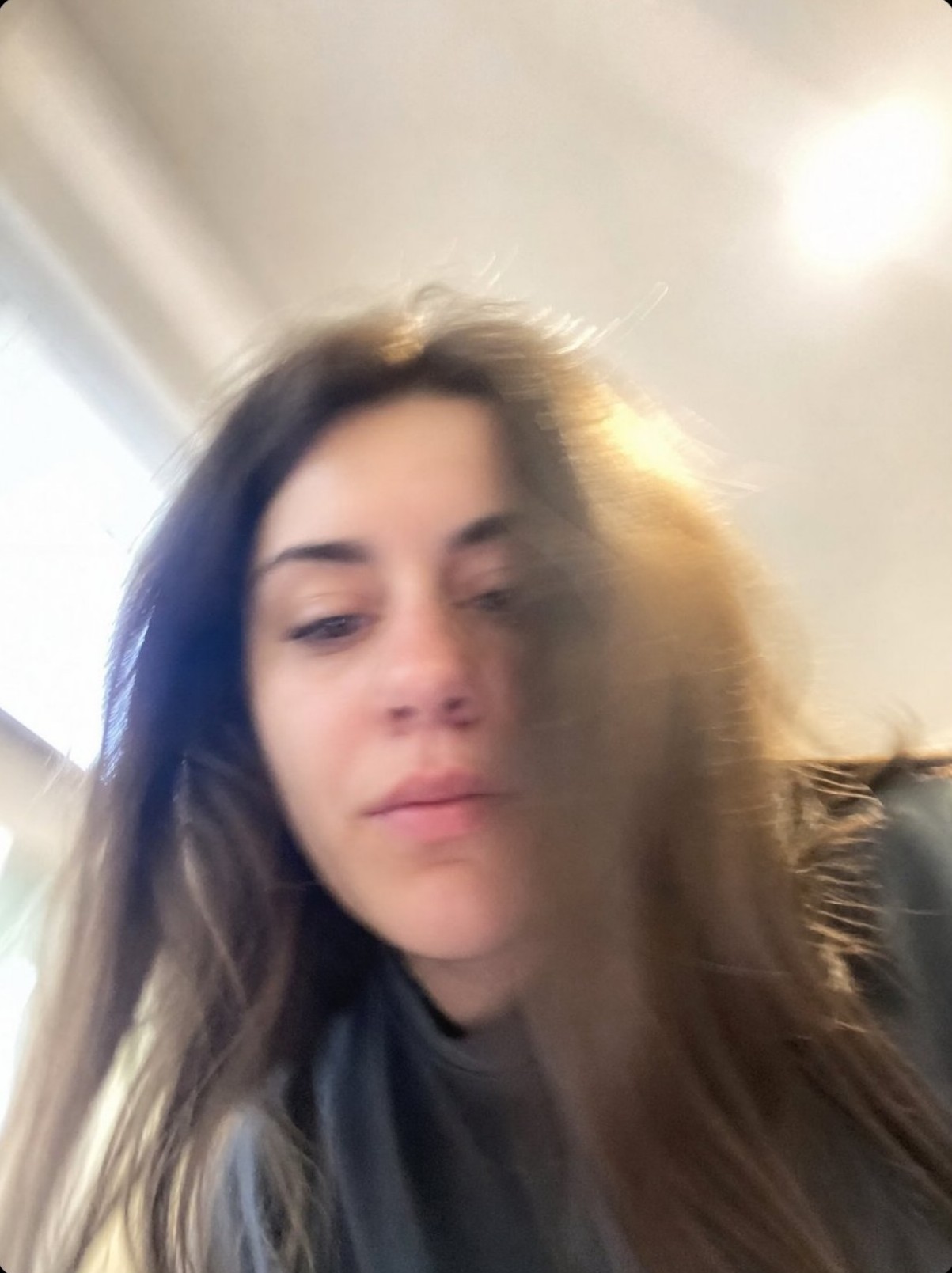 A blurry accidental human selfie generated by ChatGPT